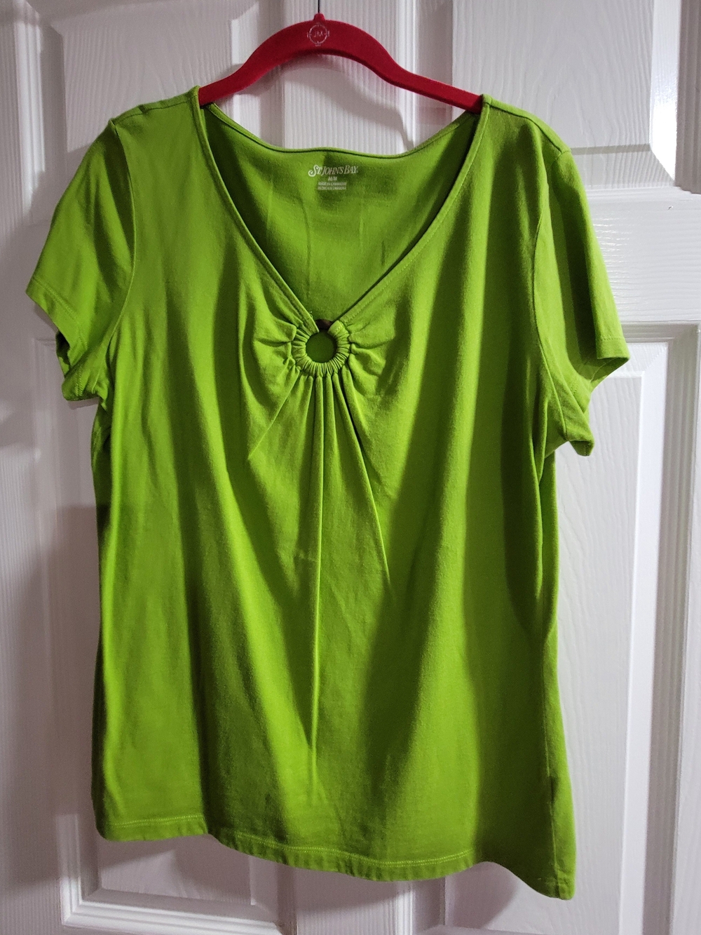 Vibrant green St. John's Bay short-sleeve top is a size medium.